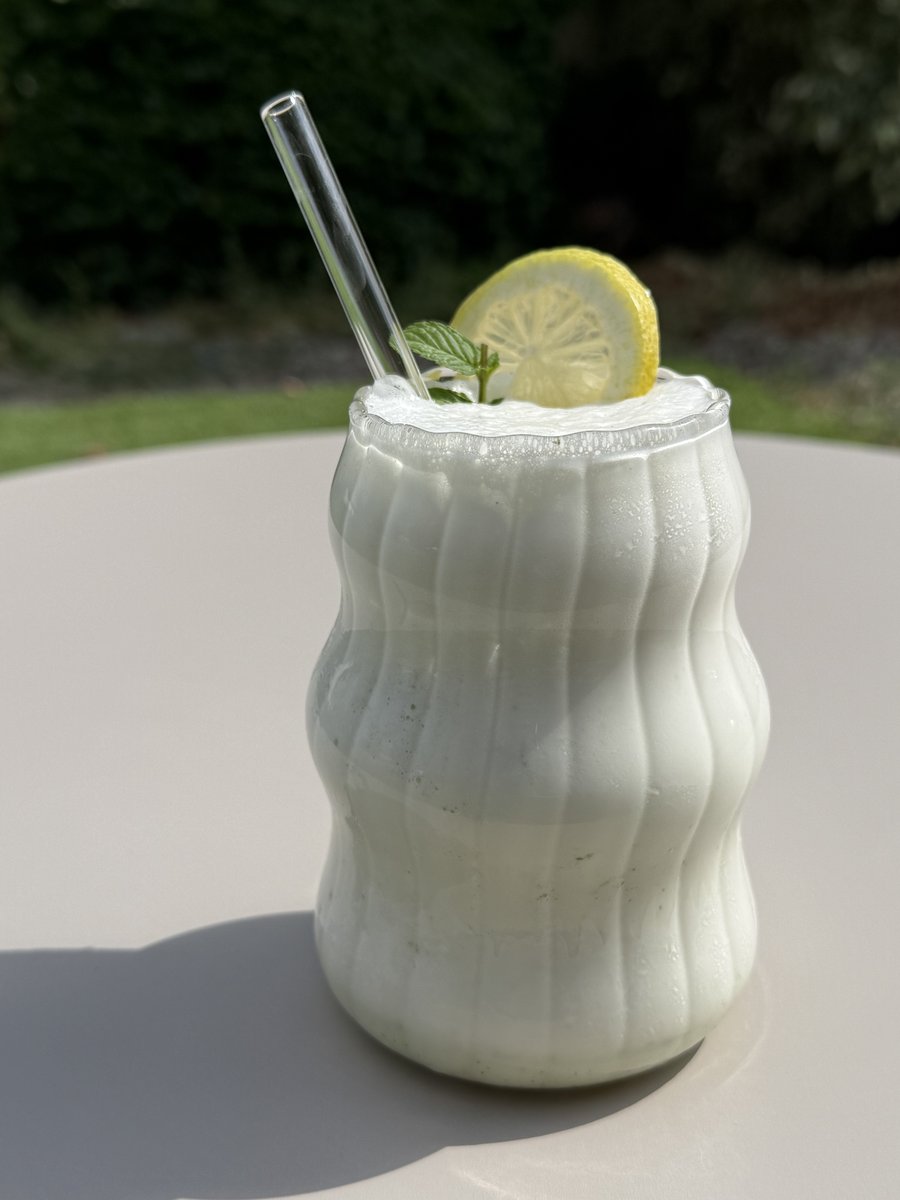 Finished mojito protein shake in a glass